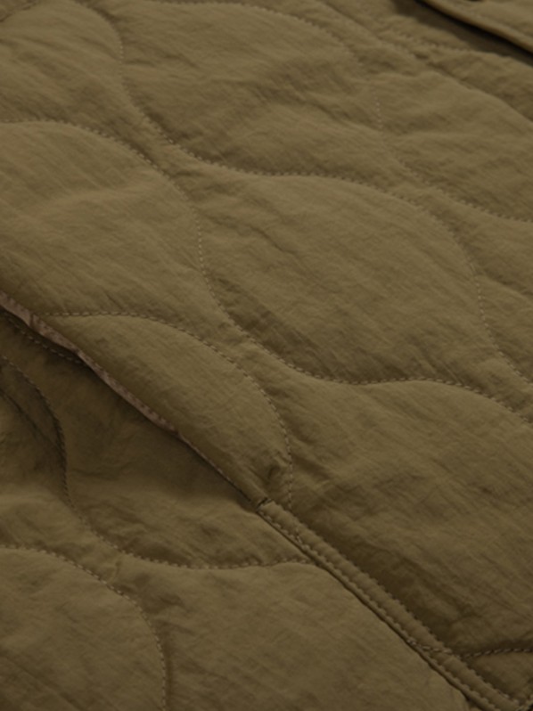 Green quilted cotton jacket Green quilted cotton jacket
