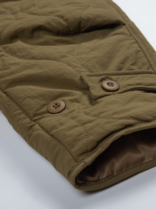 Green quilted cotton jacket Green quilted cotton jacket